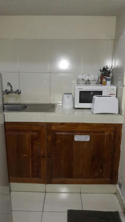 Secret Garden Inn Кута Екстериор снимка