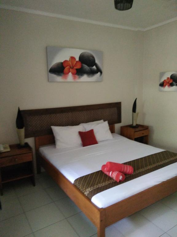 Secret Garden Inn Кута Екстериор снимка