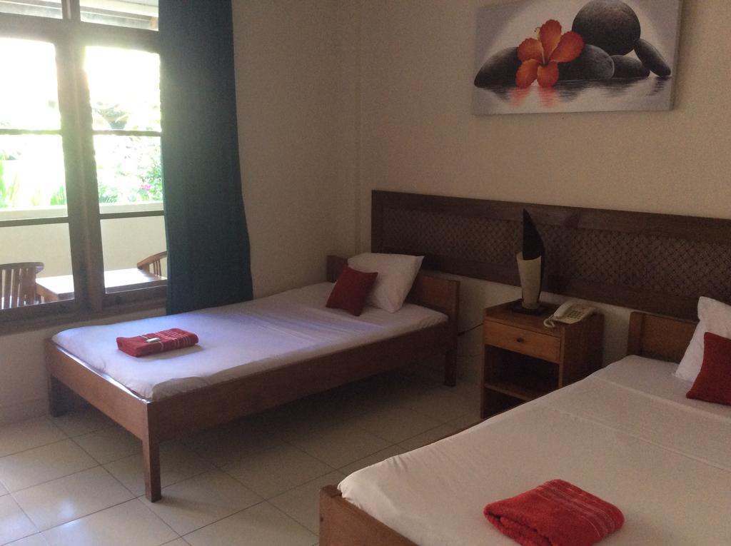 Secret Garden Inn Кута Екстериор снимка