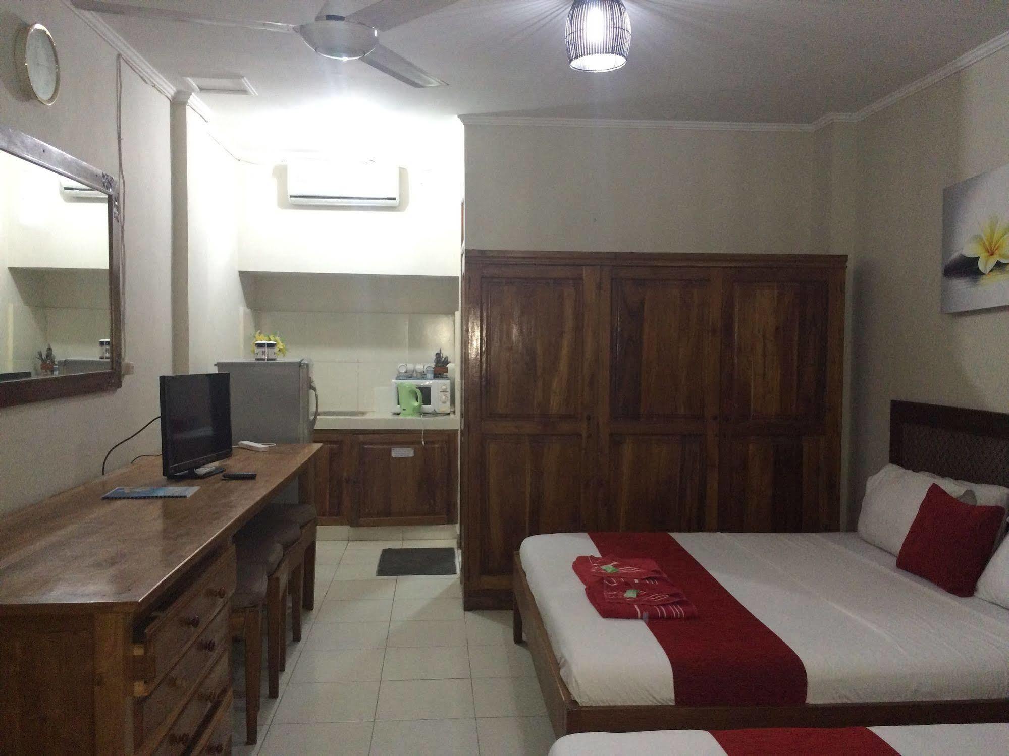 Secret Garden Inn Кута Екстериор снимка